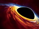 Rappresentazione artistica di un buco nero circondato dal su disco di accrescimento (fonte: ESO, ESA/Hubble, M. Kornmesser) (ANSA)