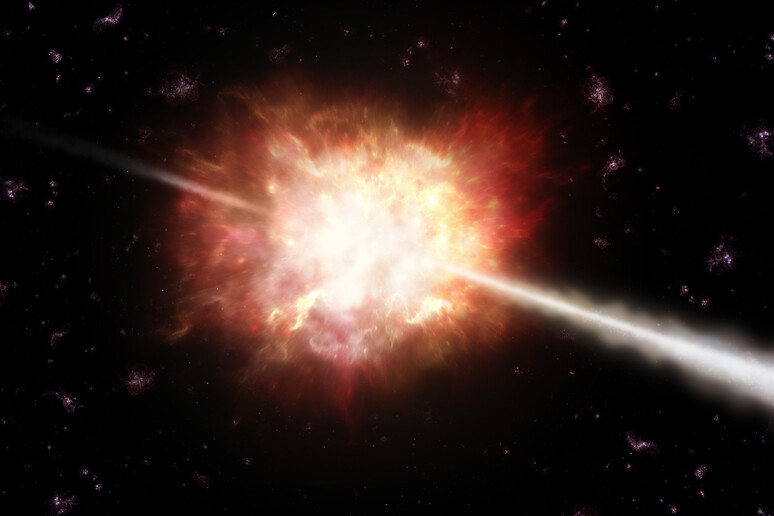 Artistic representation of a gamma ray burst (credit: ESO/A. Roquette) -     RIPRODUZIONE RISERVATA
