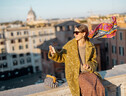 Woman enjoying beautiful morning cityscape of Rome (ANSA)