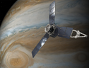 Rappresentazione artistica della sonda Juno nell'orbita di Giove (fonte: Nasa/JPL-Caltech) (ANSA)